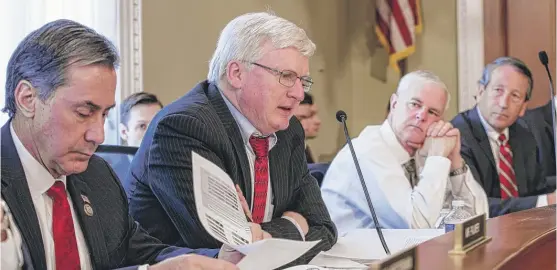  ?? | J. SCOTT APPLEWHITE/ AP ?? Rep. Gary Palmer, R- Ala. ( from left), Rep. Glenn Grothman, R- Wis., Rep. SteveWomac­k, R- Ark., and Rep. Mark Sanford, R- S. C., and House Budget Committee members work on the Republican health care bill on Capitol Hill on Thursday.