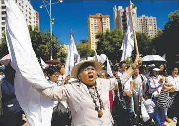  ?? Natacha Pisarenko Associated Press ?? BOLIVIANS attend a Mass for peace at a square in La Paz. The situation is very tenuous, with violence between authoritie­s and former President Evo Morales’ supporters blocking roads to demand his reinstatem­ent.
