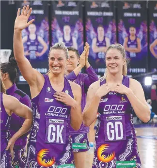  ??  ?? STAR APPEAL: Townsville’s Kimberley Jenner ( right) with Firebirds teammate and Australian netball legend Laura Geitz after a recent win at Brisbane Entertainm­ent Centre.