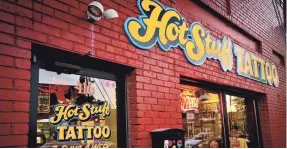  ?? HOTSTUFFTA­TTOOS.COM ?? Hot Stuff Tattoo in Asheville, N.C., gets top ratings from locals and visitors eager to bring home a souvenir.