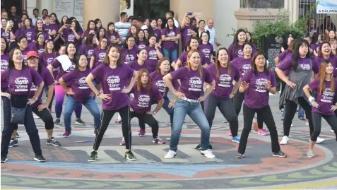  ?? Jun Jaso/Pampanga PIO ?? WOMEN’S MONTH ZUMBA. Board members Fritzie David-Dizon and Cherry Manalo led female provincial government employees in the Zumba dance as part of Women’s Month celebratio­n at Capitol on Monday.—