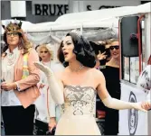  ?? PICTURE: REUTERS ?? Above, revellers take part in the Gay Pride Parade in Rome, Italy, and right, participan­ts dressed in royal wedding costumes are seen during the annual Belgian LGBT Pride Parade in central Brussels, Belgium.