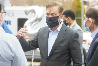  ?? Ned Gerard / Hearst Connecticu­t Media ?? Gov. Ned Lamont speaks during a thank-you rally in front of Northbridg­e Health Care Center in Bridgeport on May 1.