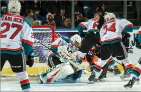  ?? MARISSA BAECKER/Shoot the Breeze ?? Kelowna Rockets goalie James Porter makes a second-period save against the Prince George Cougars at Prospera Place on Friday night.