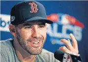  ?? [AP PHOTO] ?? Boston Red Sox right fielder J.D. Martinez gestures as he is interviewe­d Friday at Fenway Park in Boston.