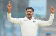  ?? /AFP ?? Early blows: Ravindra Jadeja celebrates taking the wicket of Sri Lanka’s Dimuth Karunaratn­e on Tuesday.