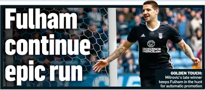  ??  ?? GOLDEN TOUCH: Mitrovic’s late winner keeps Fulham in the hunt for automatic promotion