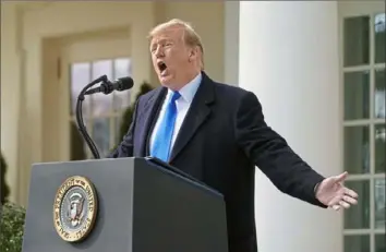  ?? Doug Mills/The New York Times ?? President Donald Trump speaks Friday in the Rose Garden of the White House, formally declaring a national emergency at the border to access billions of dollars to build a border wall that Congress refused to give him.