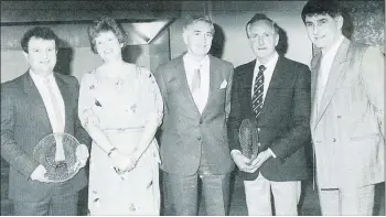  ??  ?? For voluntary engineerin­g works and community involvemen­t, John McCarthy received the Community Award at the 1985 Cavanagh Fermoy Area Sports & Community Awards. A gala presentati­on dinner dance was held at The Grand Hotel, Fermoy on February 8th, 1986 to present the awards. John (left) is pictured having received his award, in the company of l-r: Marie Cavanagh, Tom Cavanagh (sponsor), Ned Power (Hall of Fame recipient) and special guest, Kerry footballer, Mick O’Dwyer.